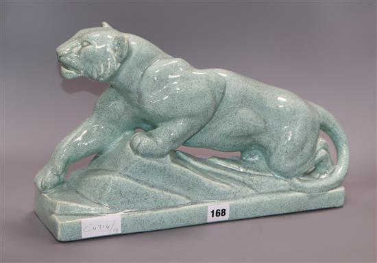 A pale turquoise glazed Art Deco pottery model of a tiger length 44cm